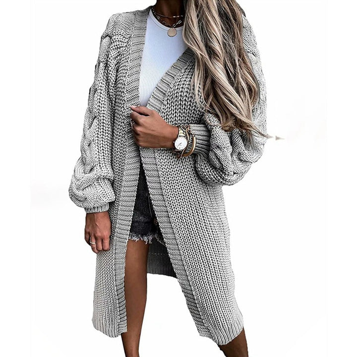 Ladies chunky knit long cardigan with puff sleeves and relaxed fit Chic and Still