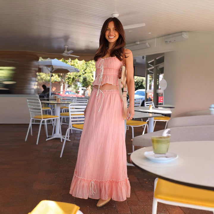Ladies' maxi dress with playful ruffled hem and practical tie bands Lune London