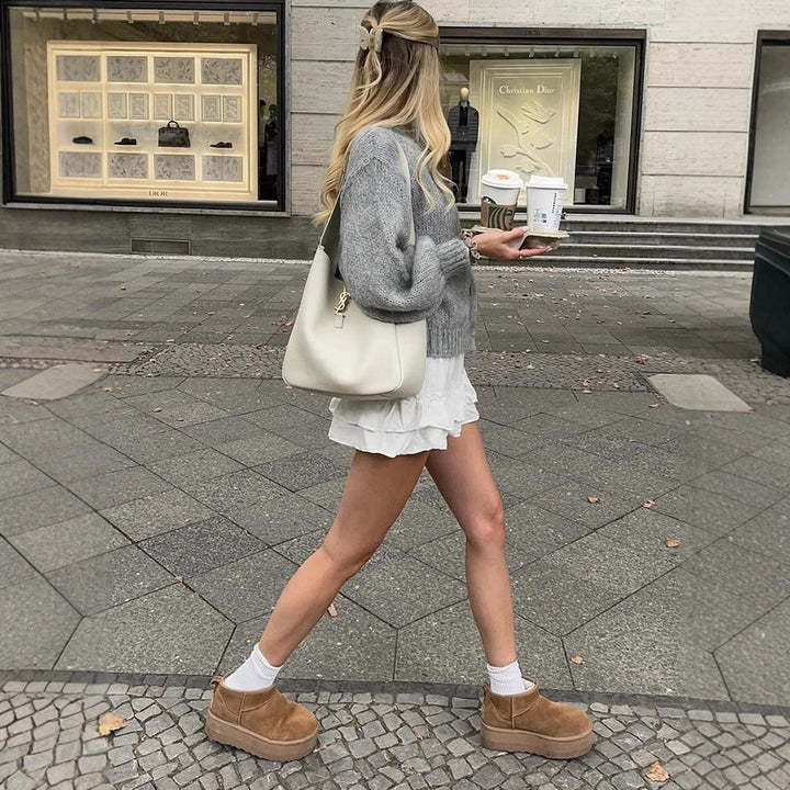 Women's cropped chunky knit cardigan with oversized balloon sleeves and visible button placket Amarae