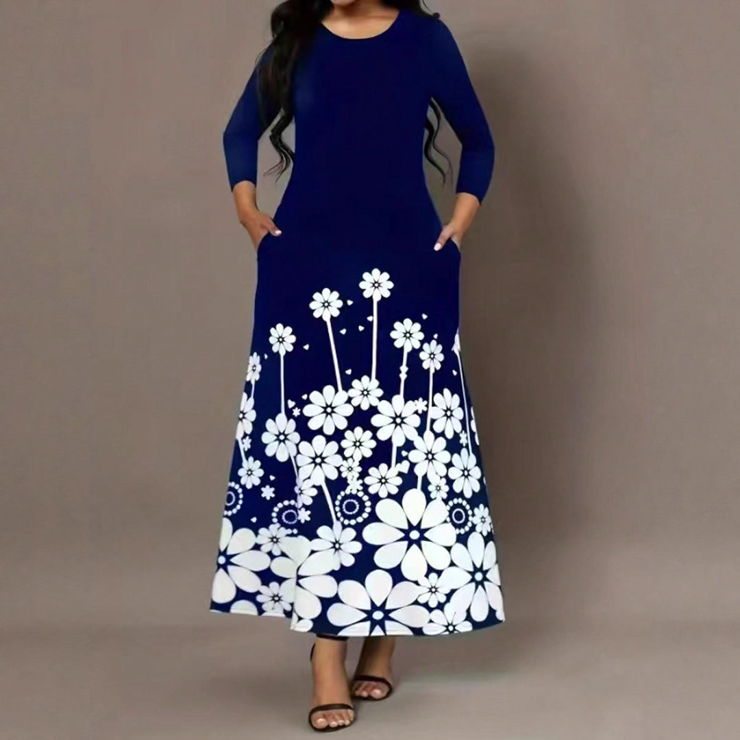 Maxi dress for women with floral design and practical side pockets Lune London