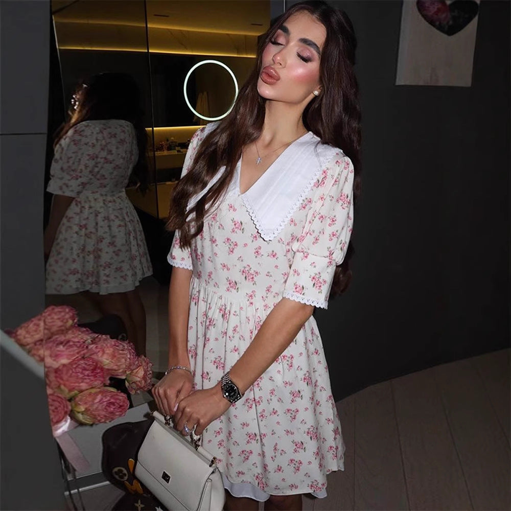 Ladies Romantic Mini Dress with Oversized V-Neck, Ruching and Floral Print Amarae