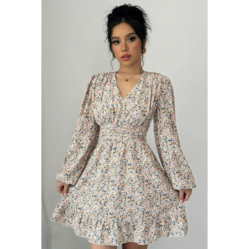 Mini dress adorned with flowers for women with deep V-neck and voluminous sleeves Lune London