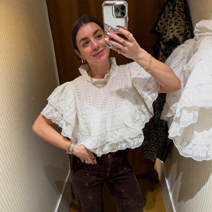 Women's lace blouse in cropped ruffle style with standing collar and layered ruffles