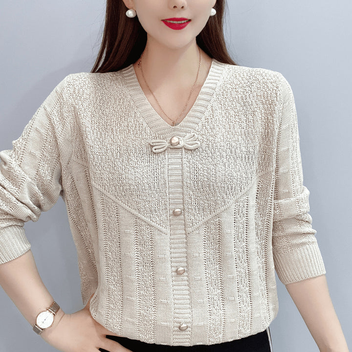 Women knit top with decorative pearl buttons and a refined bow design Lune London