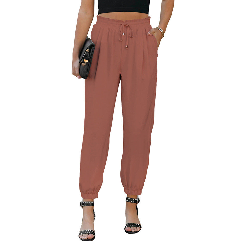 Sporty chino pants for women with elastic waistband and side pockets Lune London