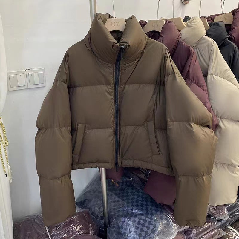 Ladies short functional quilted jacket with high collar and side pockets Amarae
