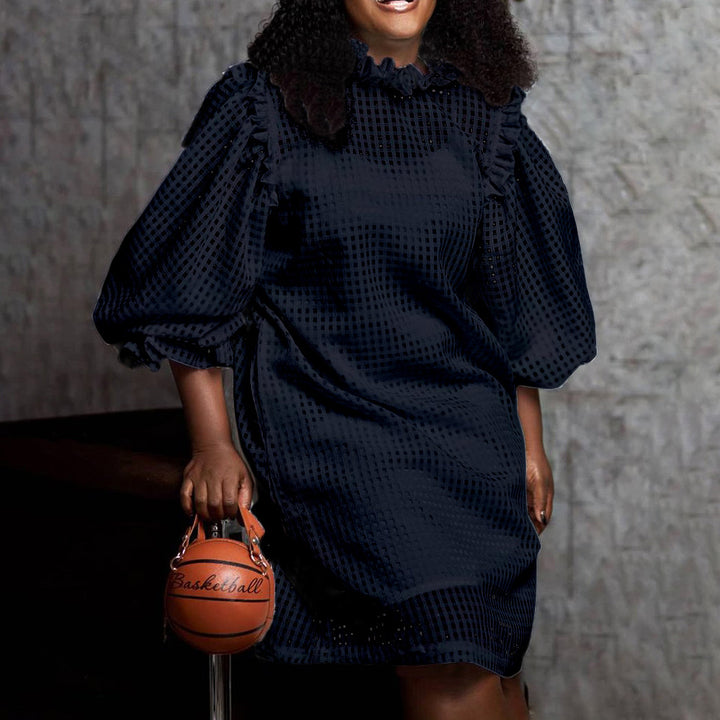 Transparent dress for women with voluminous puff sleeves and a chic check pattern.