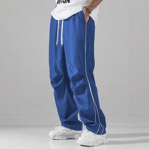 Men's sports pants with elastic waistband and contrasting stripes Amarae