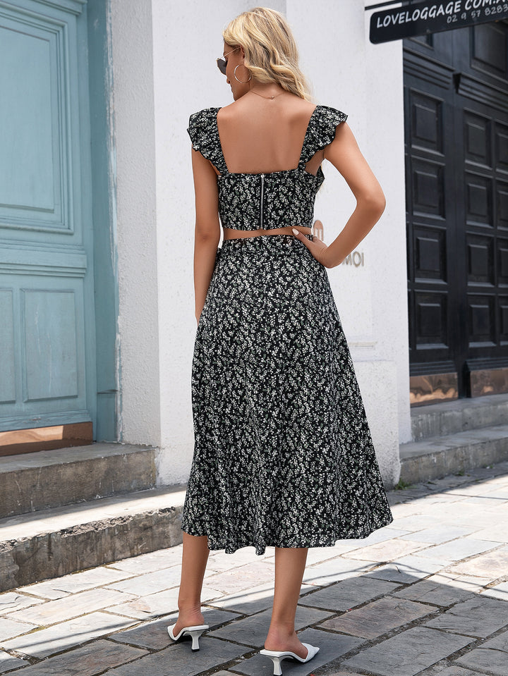 Women’s crop top and midi skirt set with floral patterns and ruffle details Lune London
