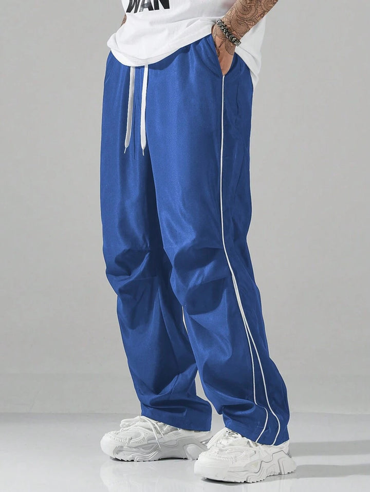 Men's sports pants with elastic waistband and contrasting stripes Lune London