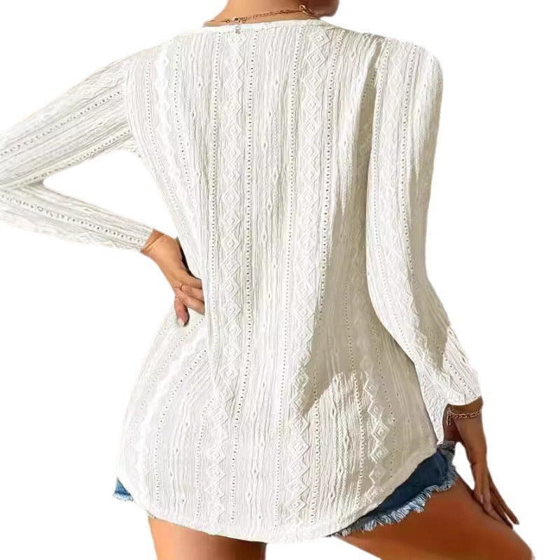 Women's blouse with decorative buttons and textured fabric Amarae