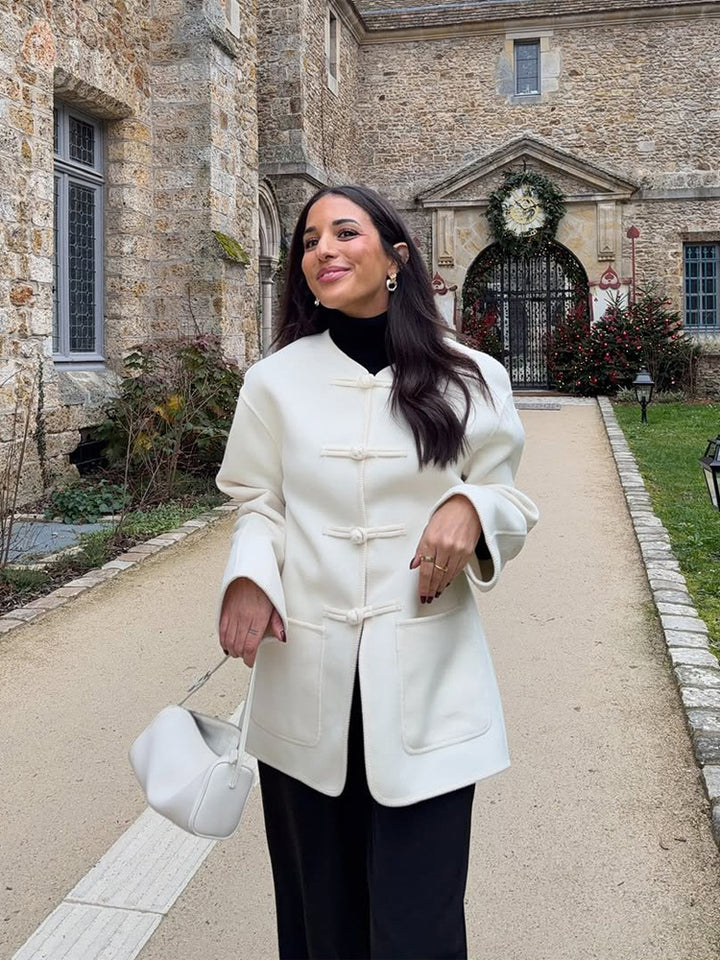 Women's short coat with Chinese toggle closures, oversized sleeves, and patch pockets Amarae