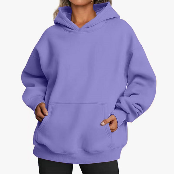 Women's oversized hoodie with practical kangaroo pockets and soft inner lining Chic & Stil