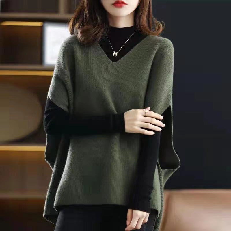 Knitted poncho for women with V-neck and chic elegant silhouette