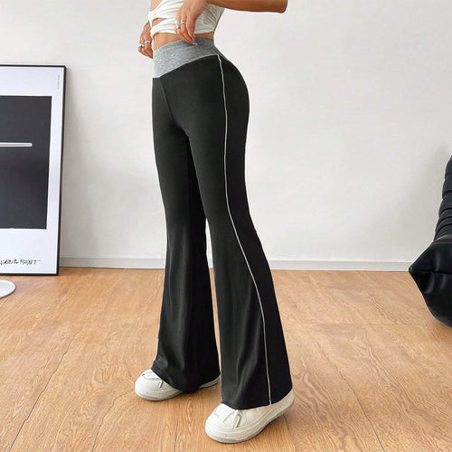 Pantalon évasé sportif pour femmes avec taille haute et inserts latéraux contrastés Chic & Stil