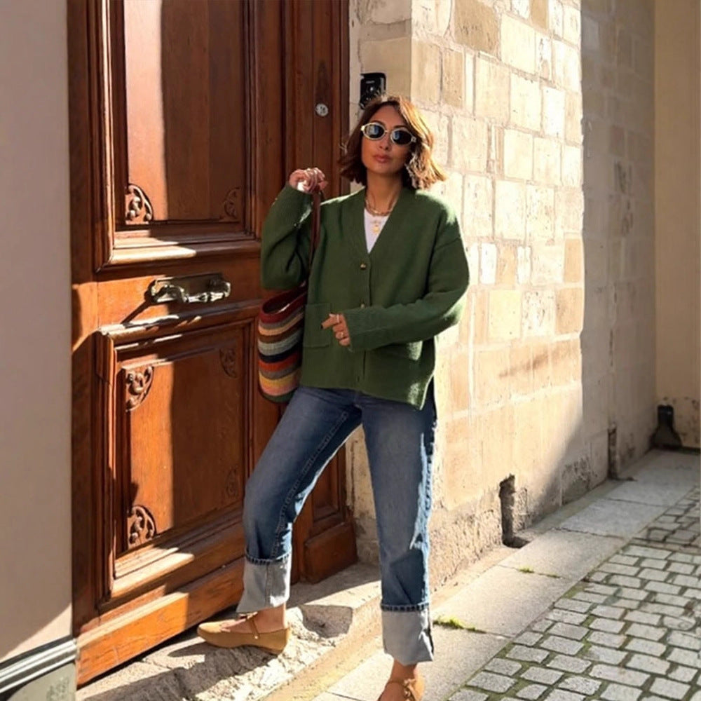 Women's oversized knit cardigan with decorative button placket, patch pockets, and elongated cuffs Amarae