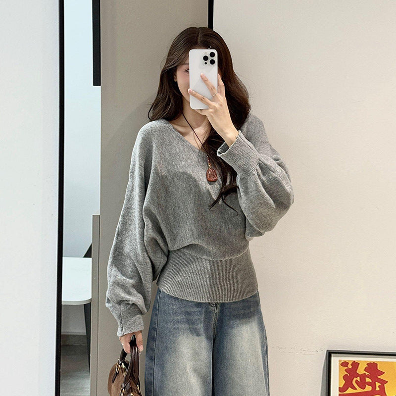 Pull féminin ample avec ceinture ajustable et décolleté en V Chic & Stil