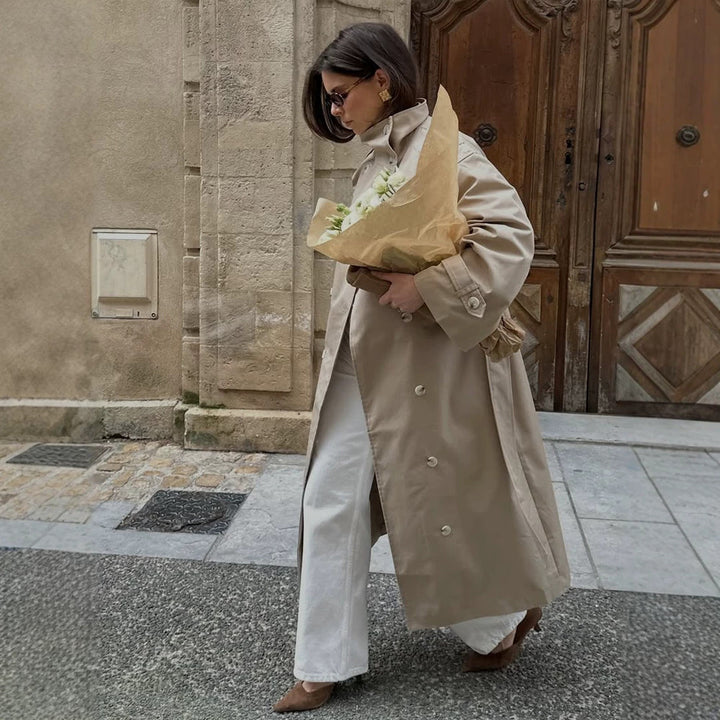 Women’s maxi trench coat with high stand-up collar, double-breasted button placket & waist belt Amarae