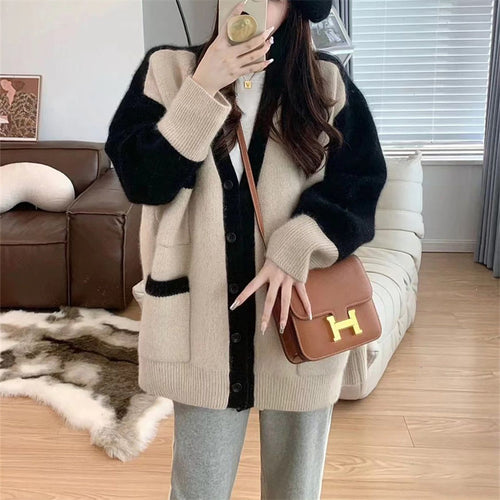 Knitted cardigan for women with decorative cut and practical pockets Amarae