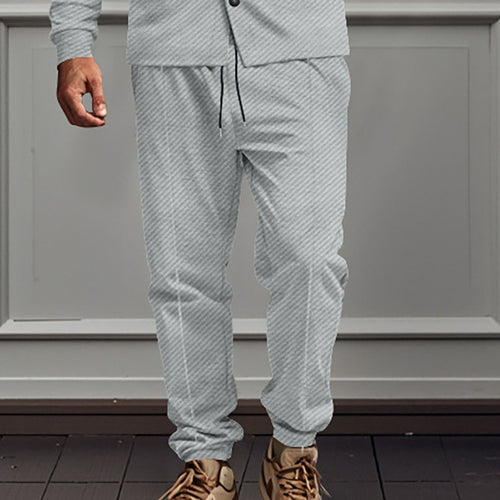 Men's branded jogger pants with elastic waistband and practical side pockets Amarae