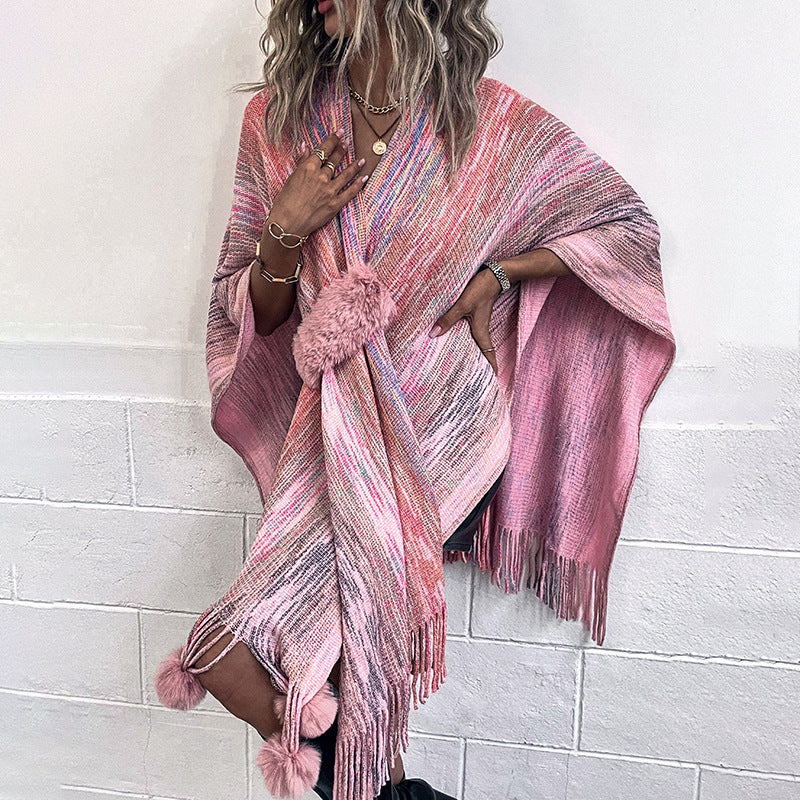 Ladies fashionable poncho with luxurious faux fur trim and creative fringes Lune London