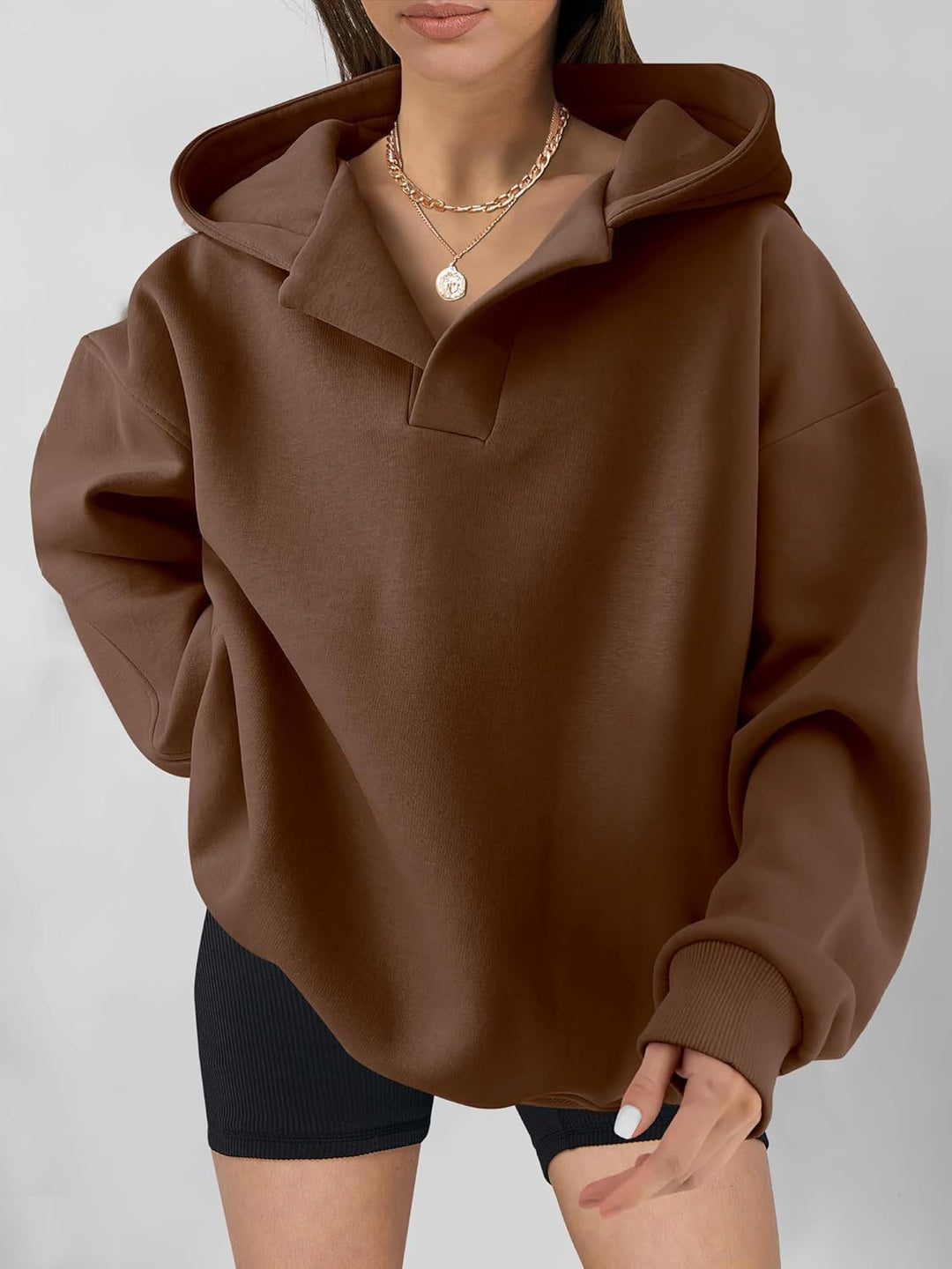 Casual women's top with high collar and oversized cut Lune London