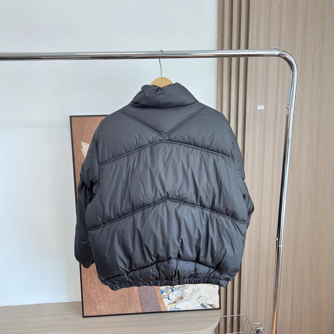 Men's short padded quilted jacket in boxy cut with high stand-up collar and zip pockets Amarae