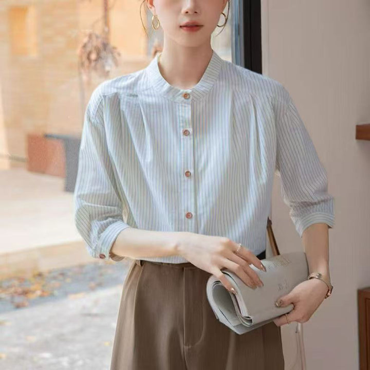 Blouse rayée élégante pour femmes avec col montant traditionnel Chic & Stil