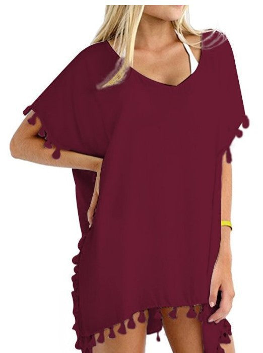 Tuniques de plage pour femmes avec une structure aérienne et des pompons ludiques Chic & Stil