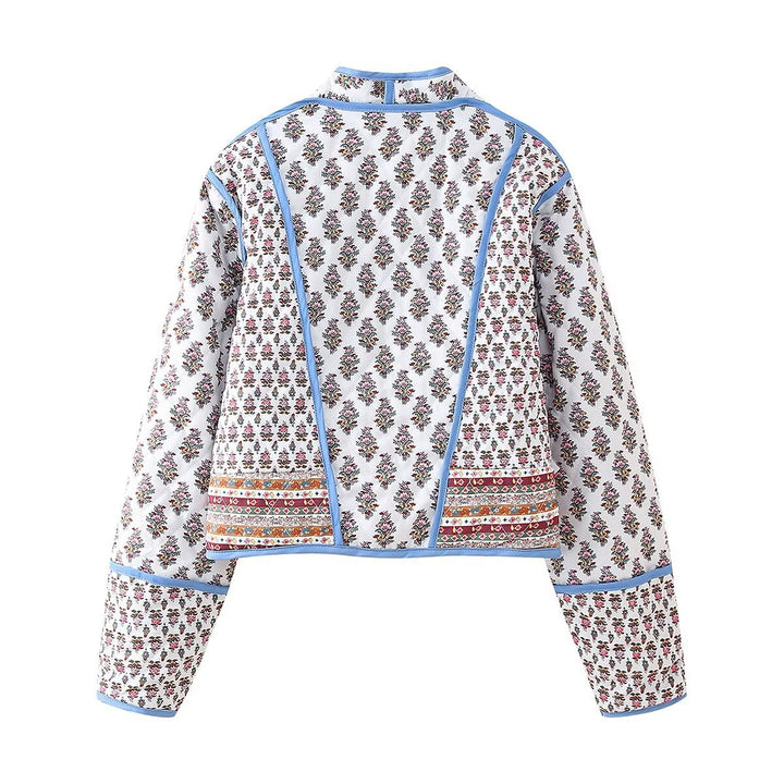 Fashionable women's cropped jacket with a floral design and elegant button details Lune London