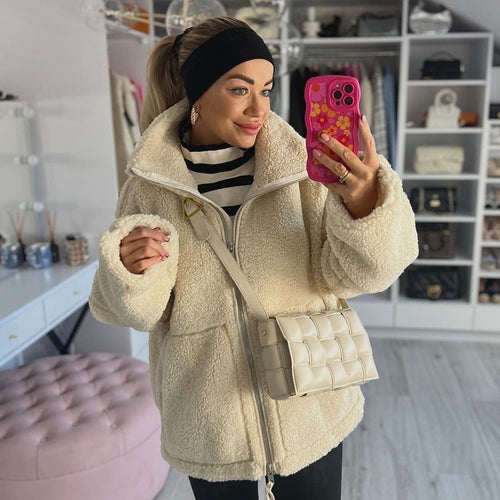 Comfortable fleece jacket for women with a high collar and practical pockets Amarae