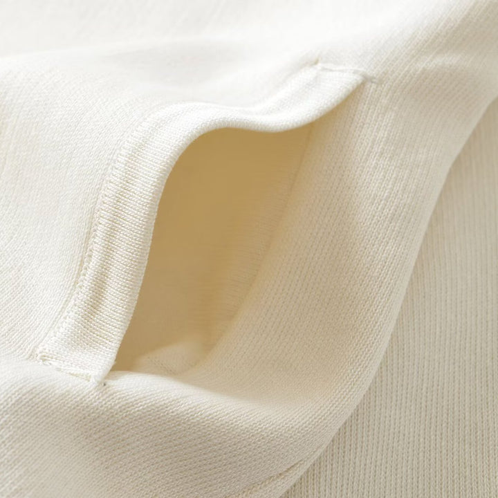 Women's loose-fitting bomber-style cardigan with button placket and ribbed cuffs Amarae