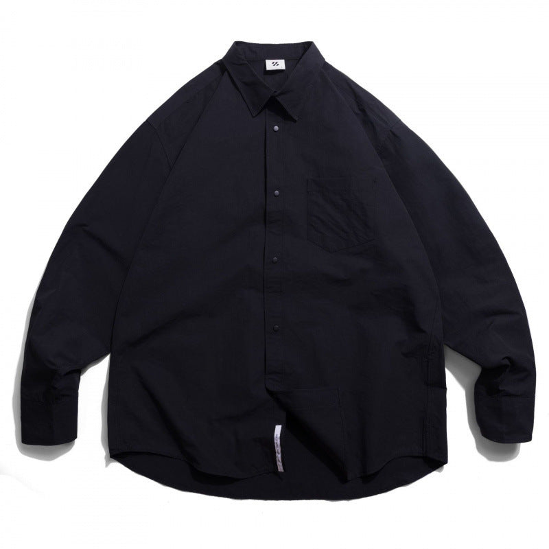 Unisex Oversize Shirt made of lightweight cotton blend with dropped shoulder and chest pocket Amarae