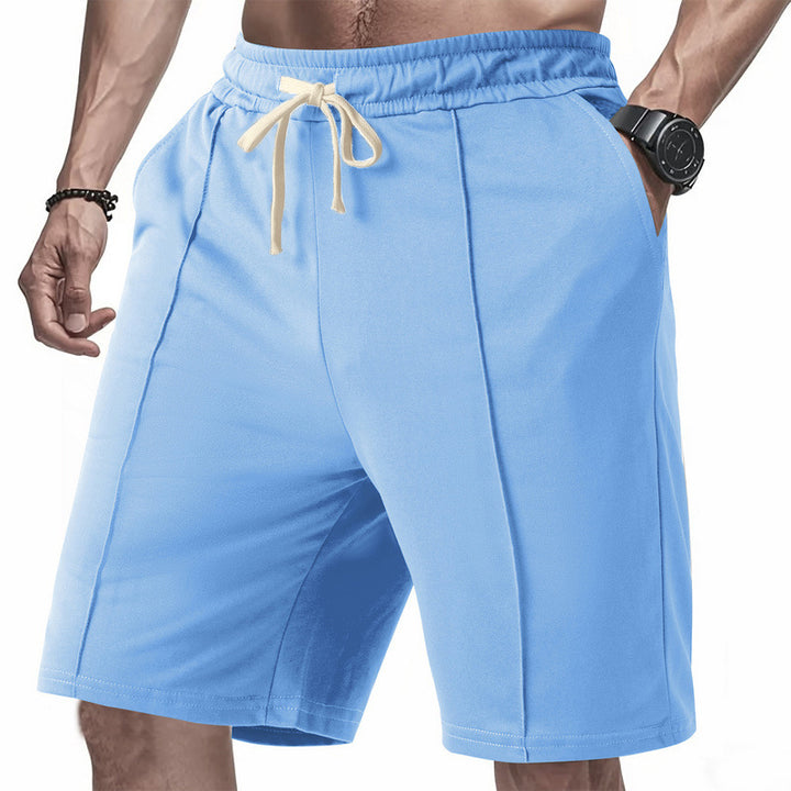 Comfortable sports shorts for men with elastic waistband and practical side pockets Lune London