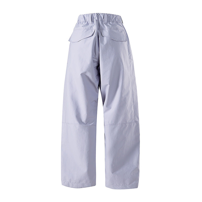 Women's wide technical trekking pants with reinforced knees, zippered pockets, and adjustable hem Amarae