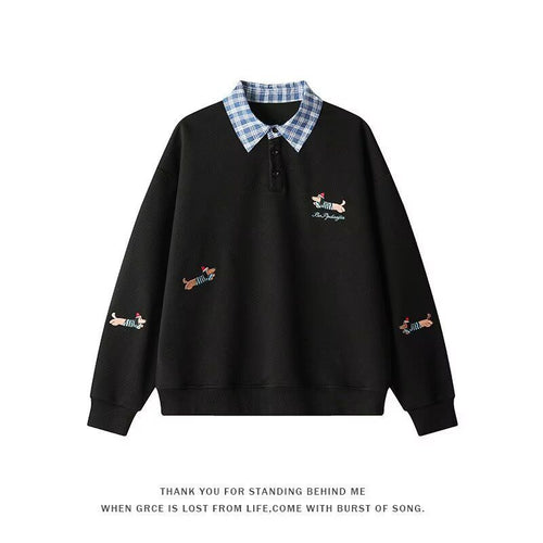 Women's sweater with an elegant checkered pattern and a chic animal print.