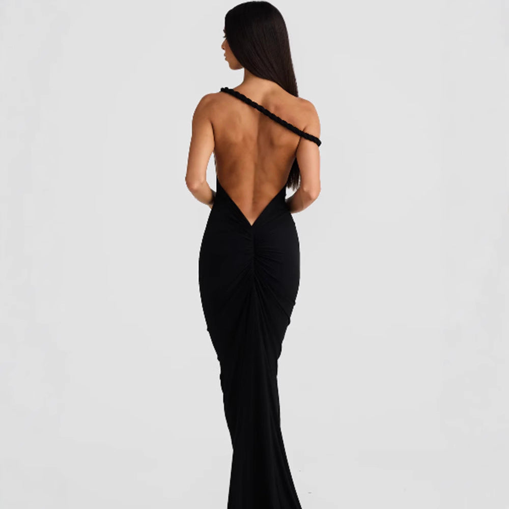 Women figure-hugging evening dress with elegant halter design and swinging hem Lune London