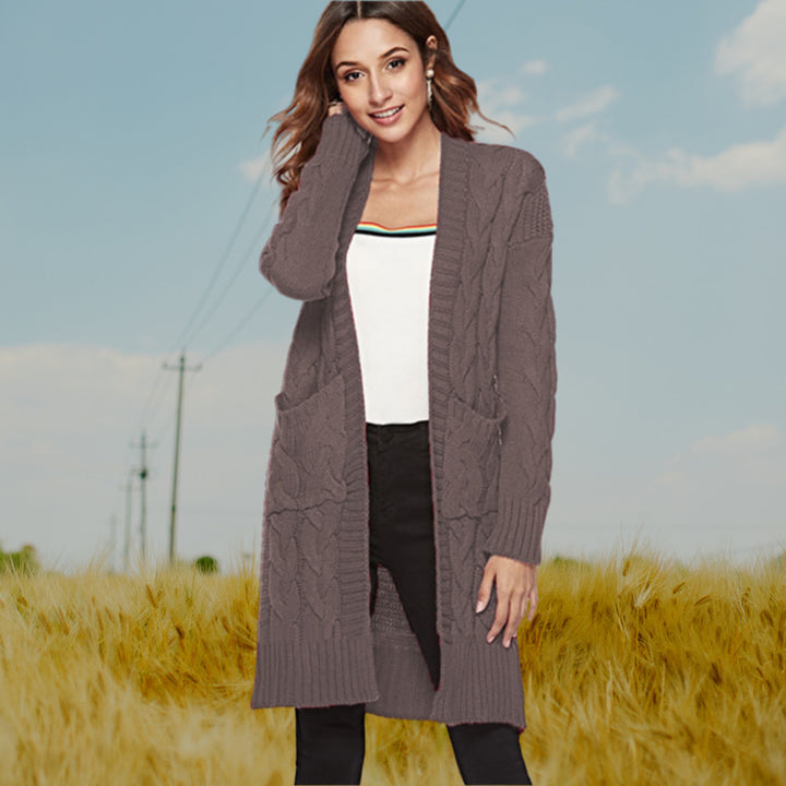 Ladies chunky knit cardigan with deep pockets and decorative relief pattern Lune London