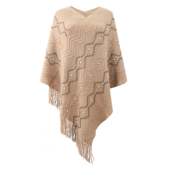 Lune London Elegant poncho for women with a striking textured pattern and decorative fringes