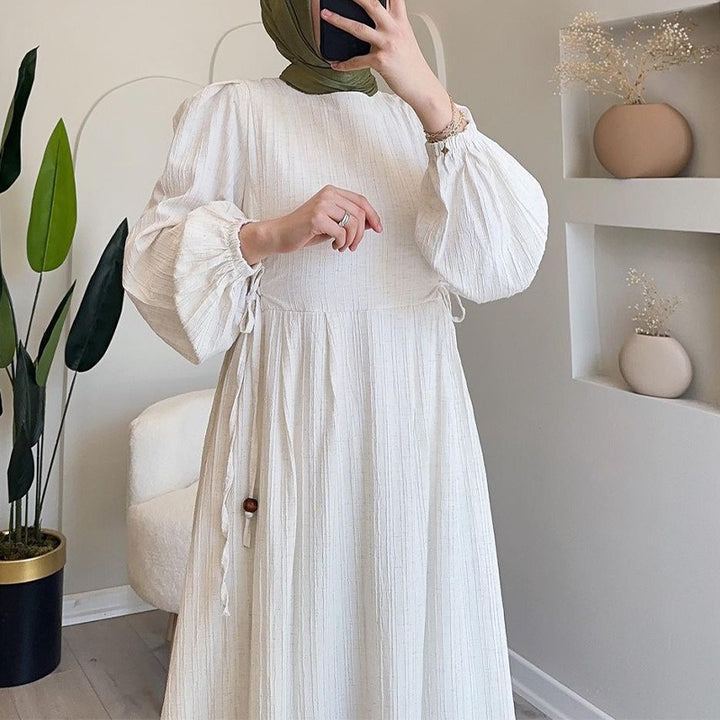 Maxi dress for women with textured design and puff sleeves Lune London