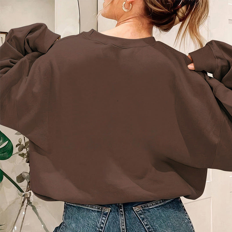 Sweat-shirt femme avec impression statement décontractée et manches larges Chic & Stil