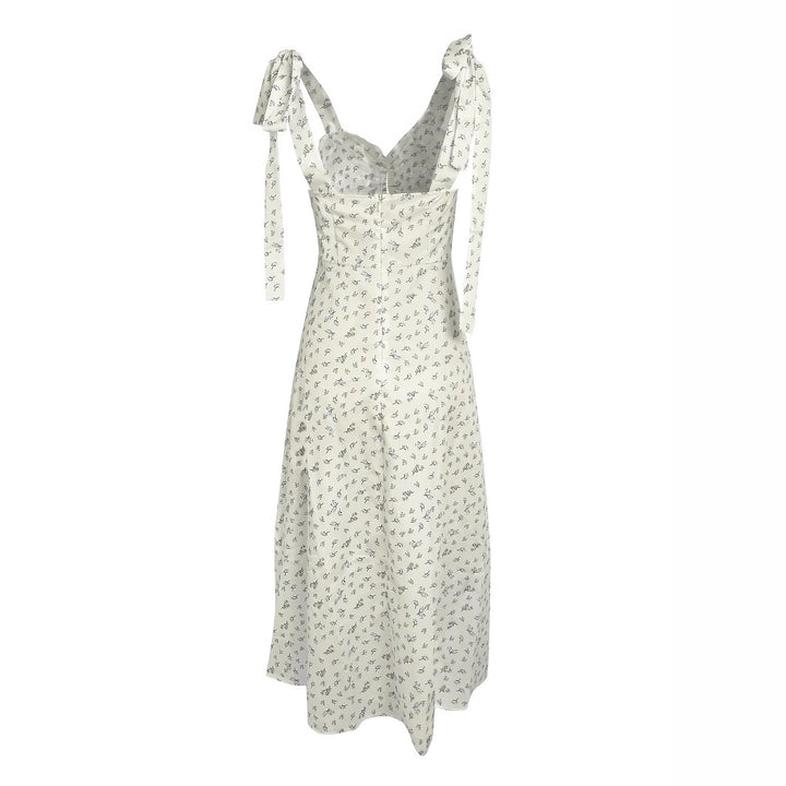 Ladies Elegant Summer Dress with a delicate floral pattern and refined straps Lune London