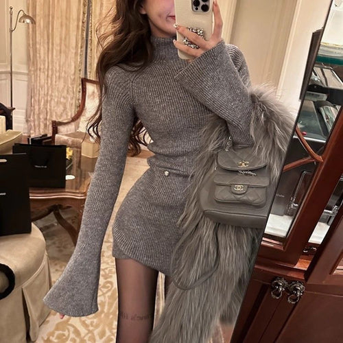 Women’s knitted dress with high collar and wide sleeves Chic & Stil