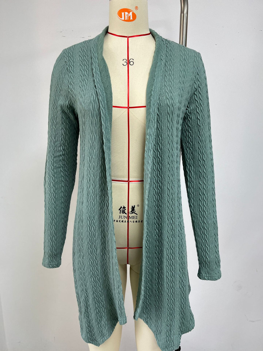 Ladies knitted vest with structured waffle pattern and open front Lune London