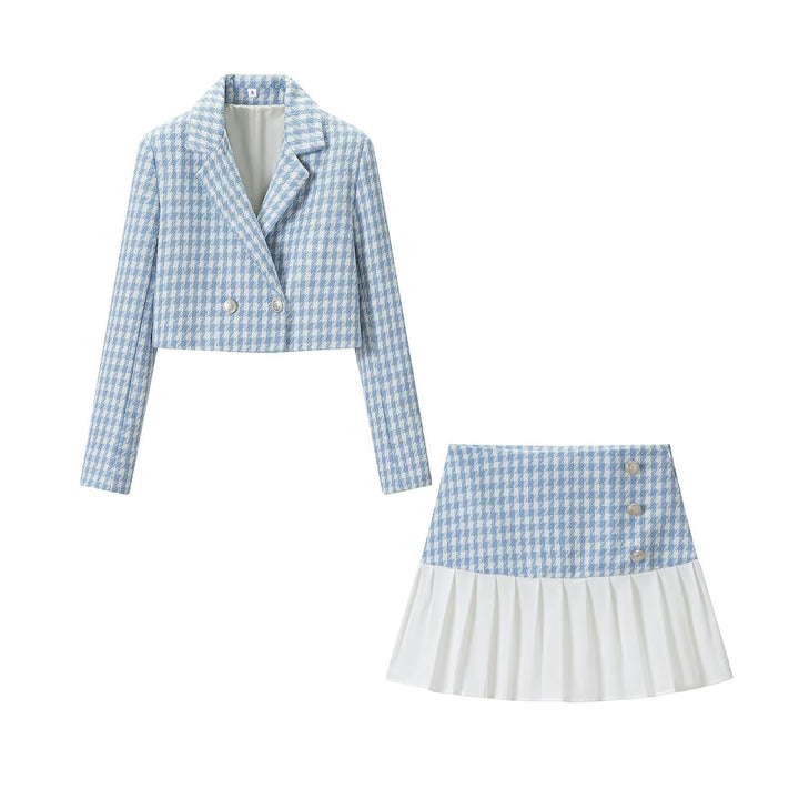 Ladies two-piece short blazer and pleated skirt ensemble in houndstooth style Amarae