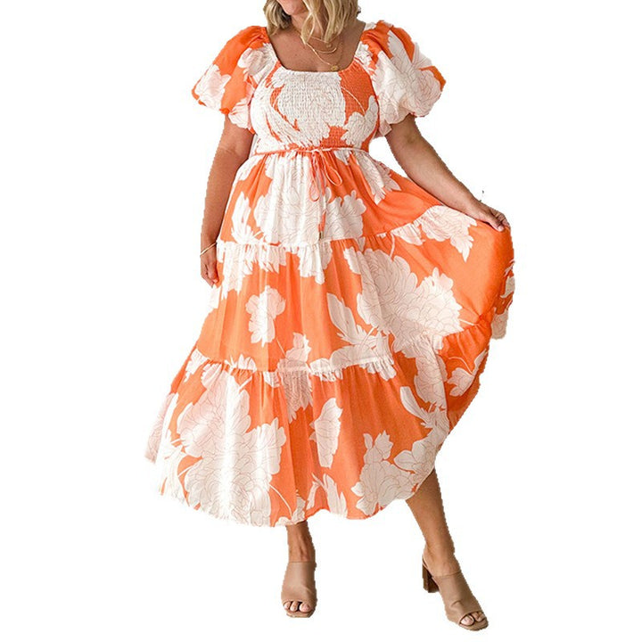 Robe Maxi pour femmes avec de volumineuses manches bouffantes et un design floral Chic & Stil