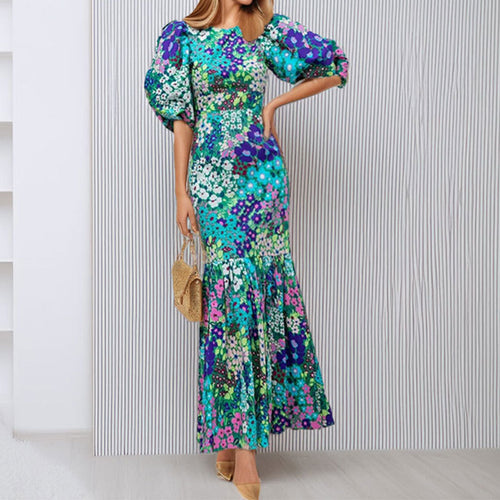Robe maxi pour femmes avec des manches bouffantes volumineuses et des motifs floraux Chic & Stil