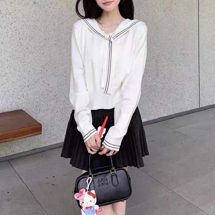Pull femme élégant avec col à nœud et fine structure en tricot Lune London