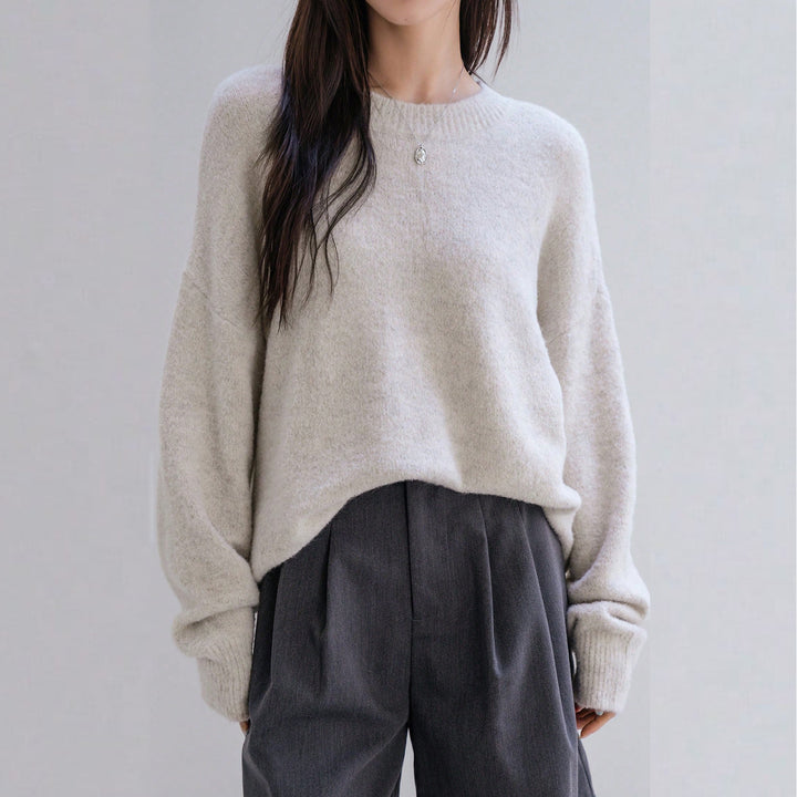Pull en tricot épais pour femme avec une coupe décontractée et des manches volumineuses Chic & Stil