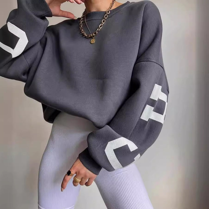 Ladies Oversized Sweatshirt with Chic Logo and Striking Style